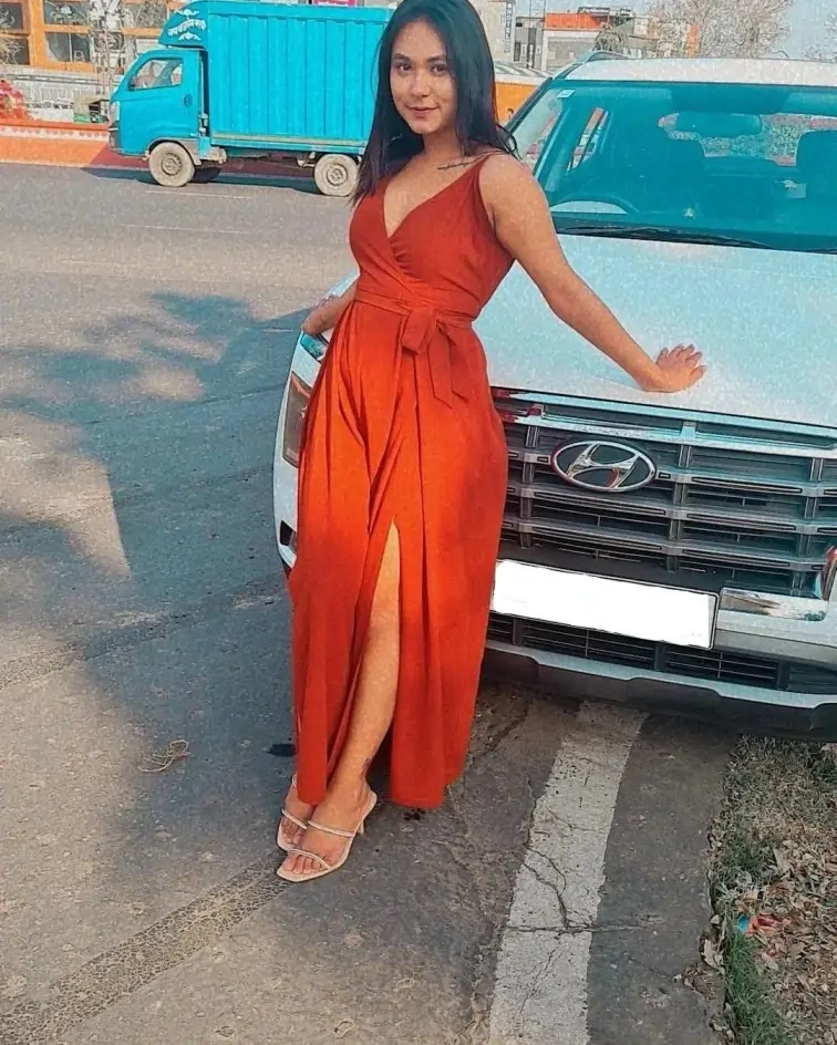 Noida Call Girl smiling outdoors